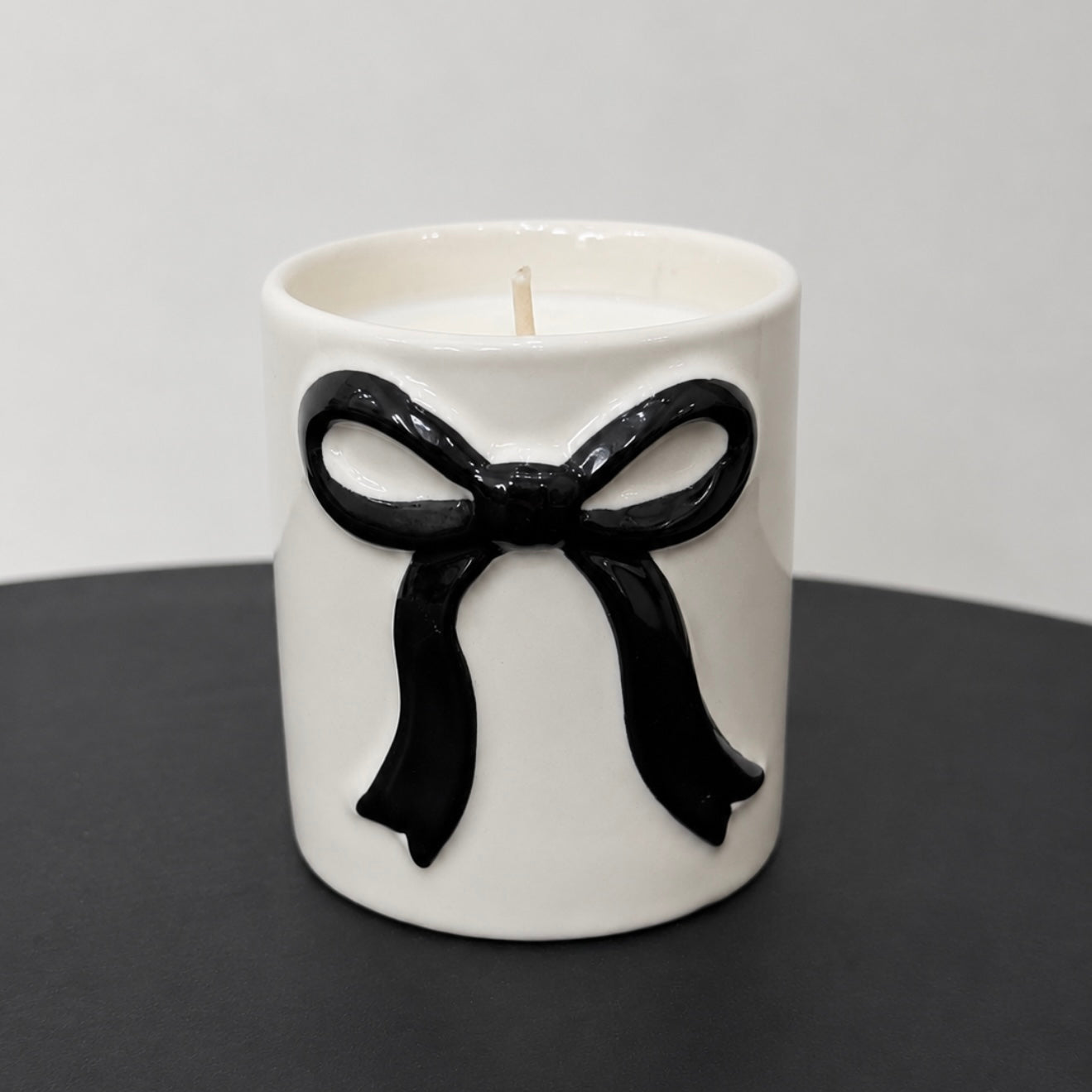 BABY BOW CANDLE Cream and Black